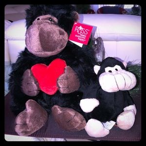 ONE LARGE GORILLA AND ONE SMALL MONKEY